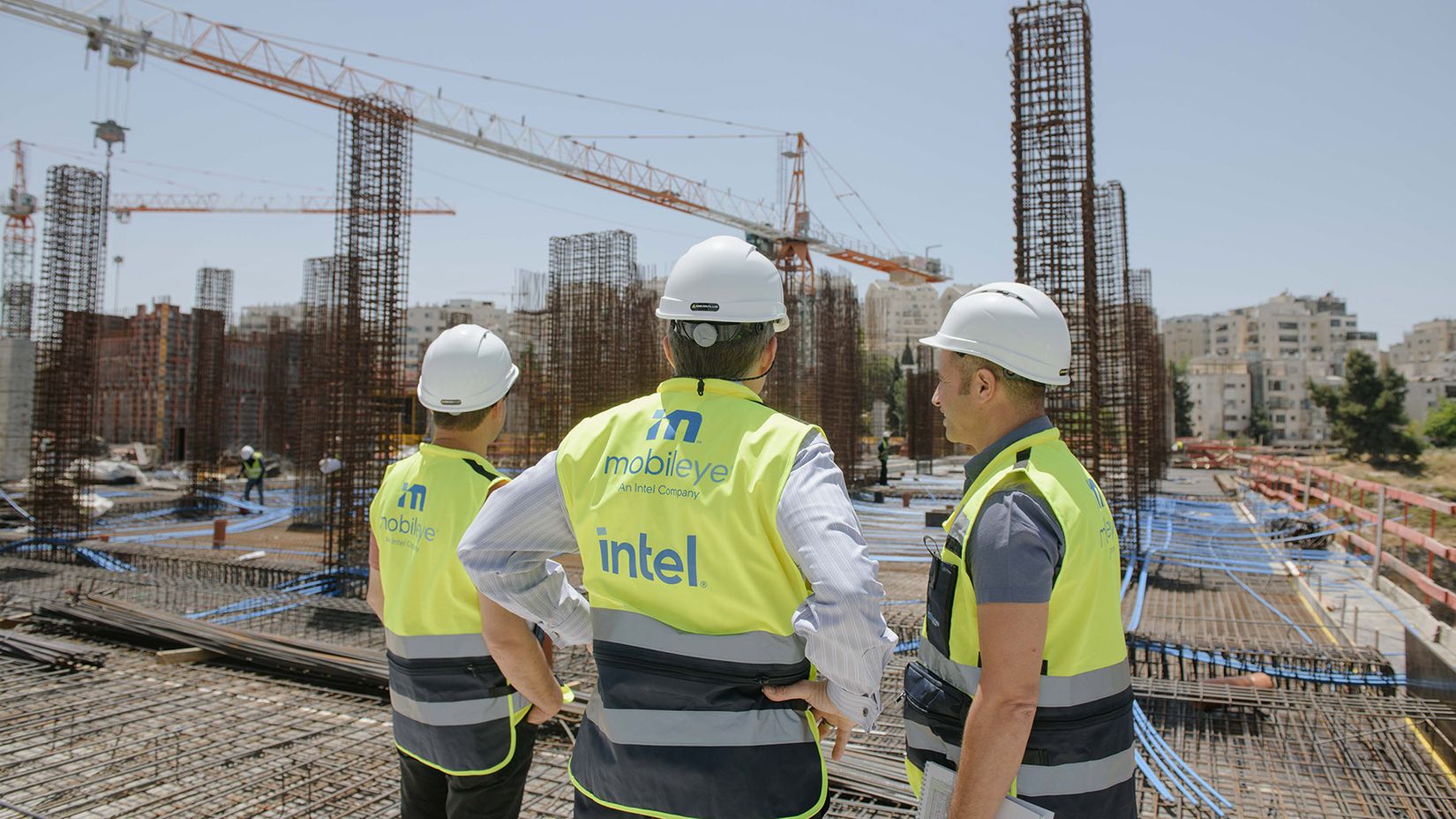 Mobileye’s CEO Prof. Amnon Shashua, chairman Pat Gelsinger, and COO Kobi Ohayon survey construction of our new campus.