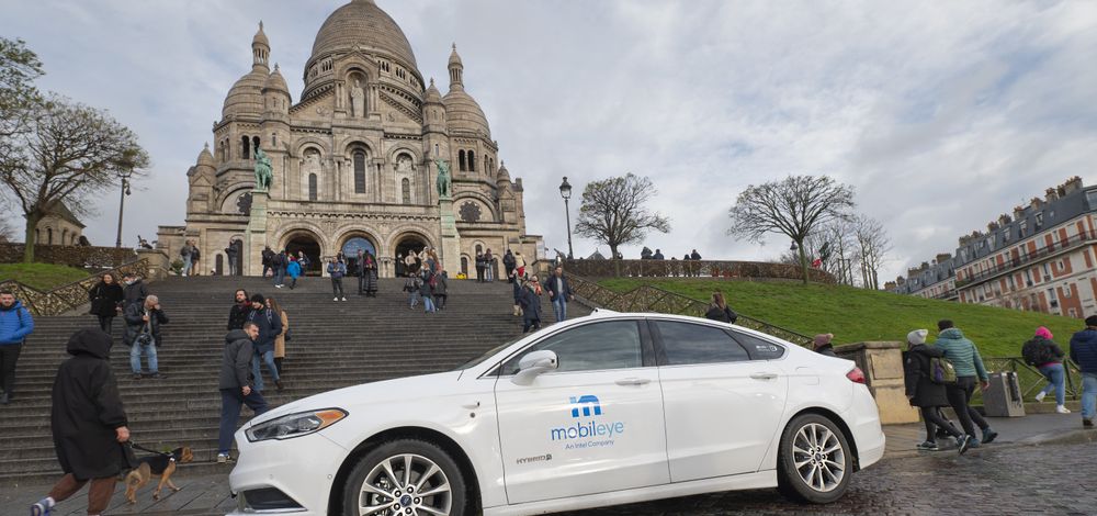 A self-driving vehicle from Mobileye’s autonomous fleet drives past Sacré-Cœur in Paris. (Credit: Mobileye)