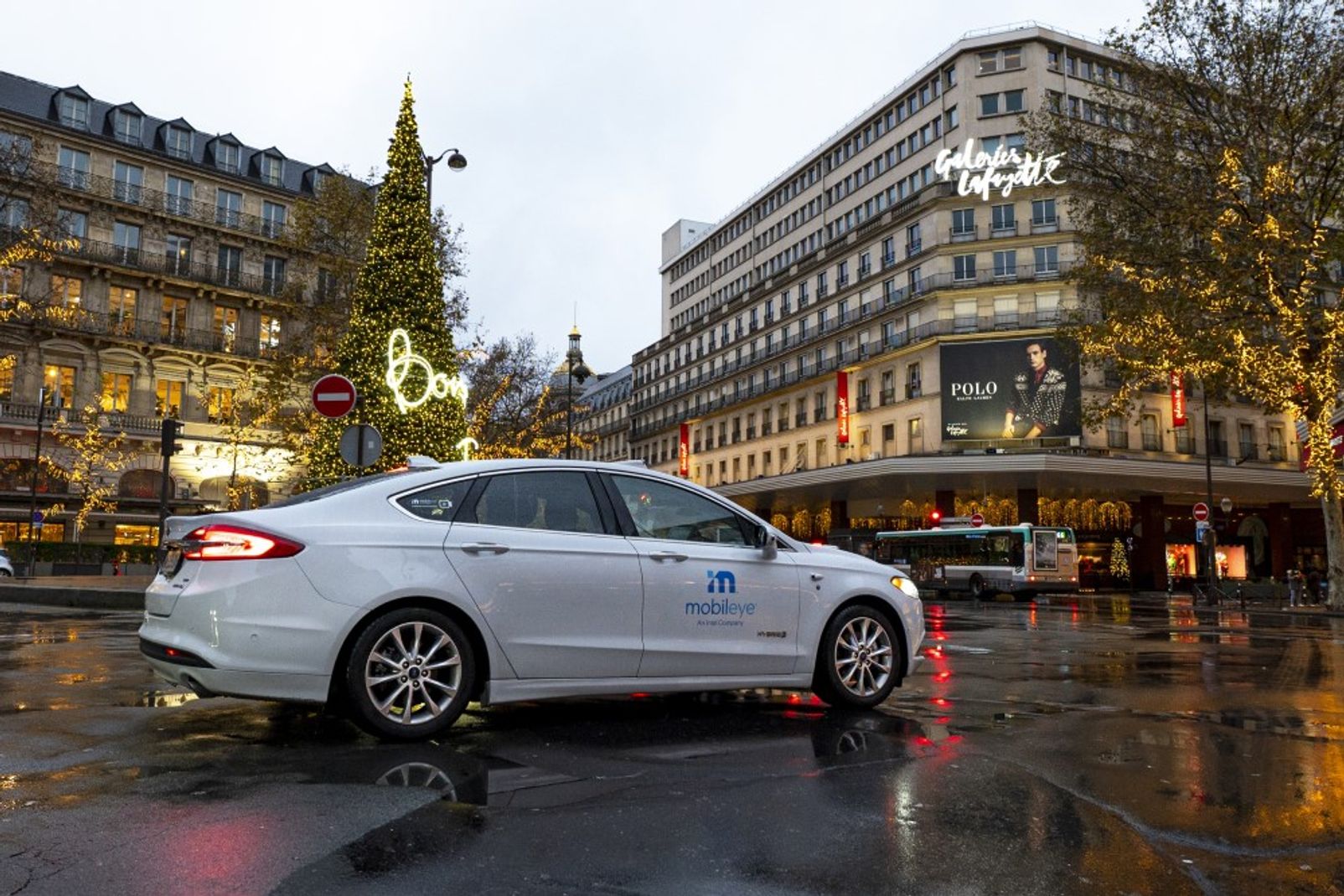 Mobileye autonomous vehicle outside the Galeries Lafayette Paris Haussmann department store