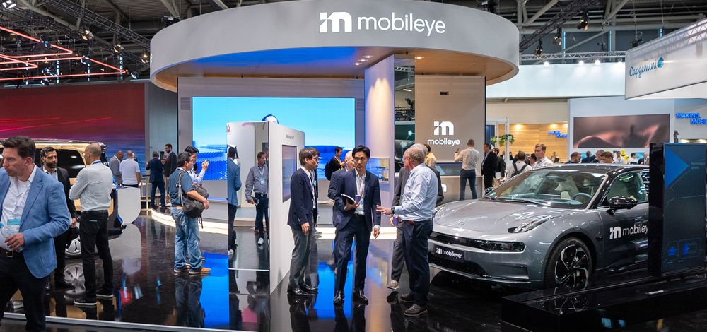 Mobileye's booth at IAA Mobility 2023 showcased the Zeekr 001 with Mobileye SuperVision™ and VW ID. Buzz with Mobileye Drive™.