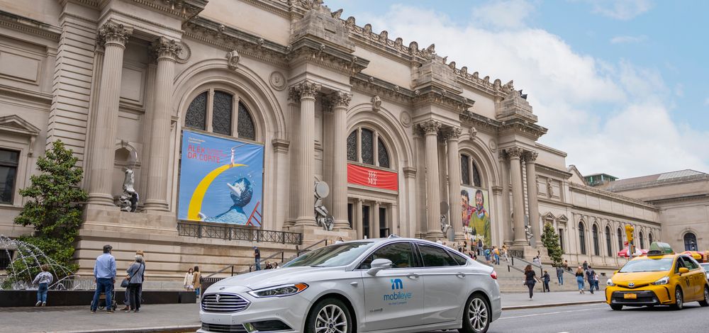 A self-driving vehicle from Mobileye’s autonomous test fleet passes New York City’s Metropolitan Museum of Art in June 2021.